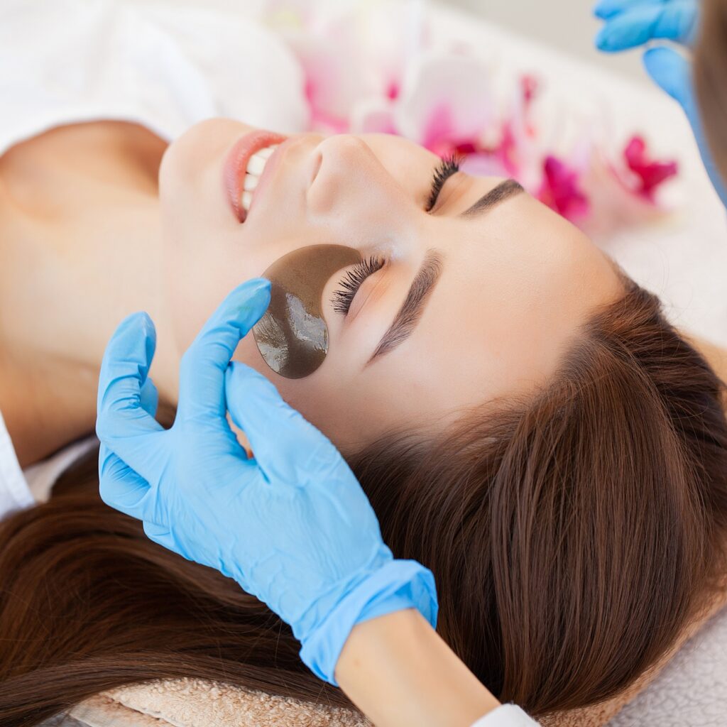 Woman With Eye Patches, Relaxing In Spa Center